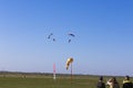 Skydivers landing on a predefined point